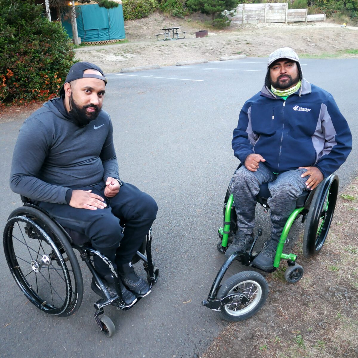 P1010779 Two men in wheelchairs.
